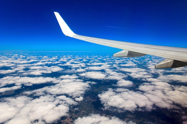 Looking through window aircraft during flight in wing