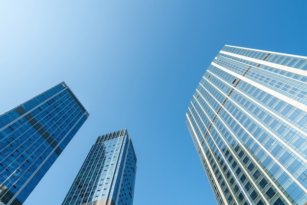 Looking Up Blue Modern Office Building