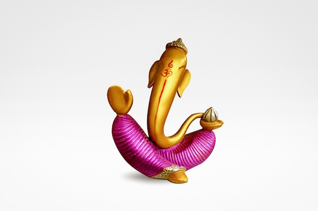 Lord ganesha antique sculpture on white background