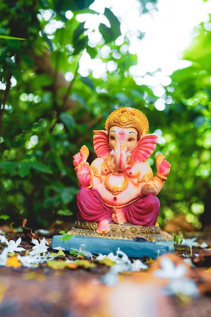 Lord ganesha sculpture on nature background