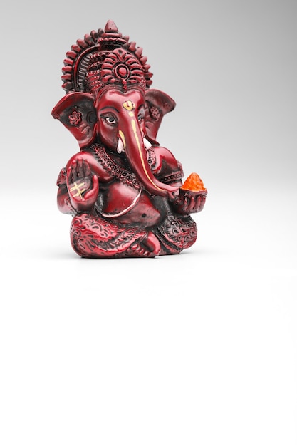 Lord ganesha sculpture on white background