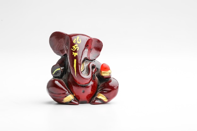 Lord ganesha sculpture on white background