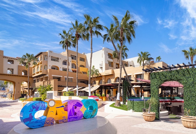 Los Cabos colorful letters in Cabo San Lucas marina cruises and lancha boats to El Arco Arch