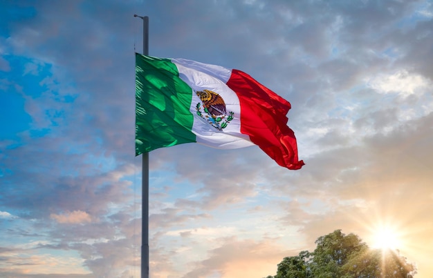 Los Cabos Mexico Mexican tricolor national flag proudly waving at mast in the air