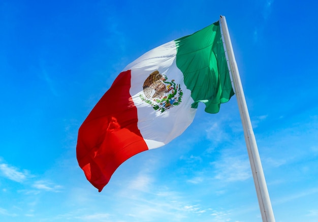 Los Cabos San Jose Del Cabo Mexico Mexican tricolor national striped flag proudly waving at mast