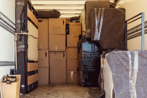 A lot of boxes and packages from a move inside a truck