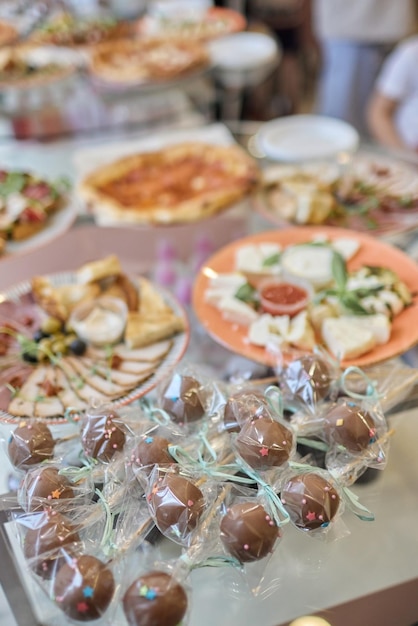 A lot of cold snacks on buffet table catering