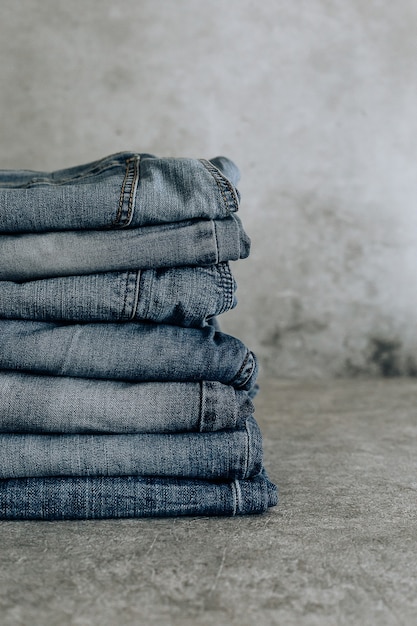 Lot of different blue jeans Blue Jeans, stack of jeans.