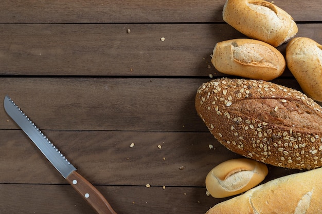 Lot of French Bread Types on a wooden desk