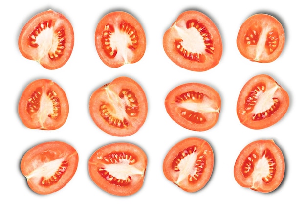 A lot of sliced ripe tomatoes on a white isolated background a lot of tomatoes