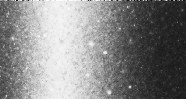 Photo a lot of snow falling on a black background with particles and stars