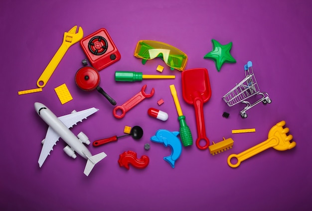 A lot of various children's toys on purple