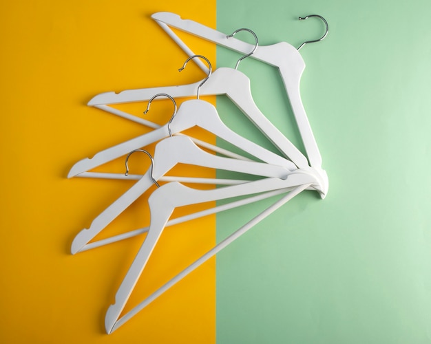 A lot of white hangers. top view.