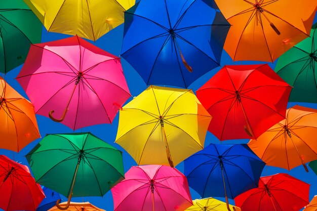 Lots of colorful umbrellas in the sky. City decoration