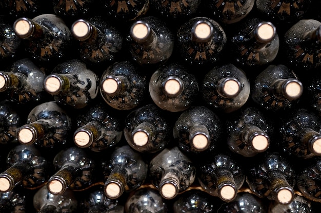 Lots of red wine bottles at a winery