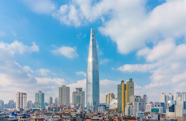 Lotte World Tower and cityscape with cloudy blue sky in winter