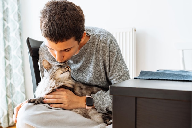 Love and care for pets, teenager and cat friends spend time together