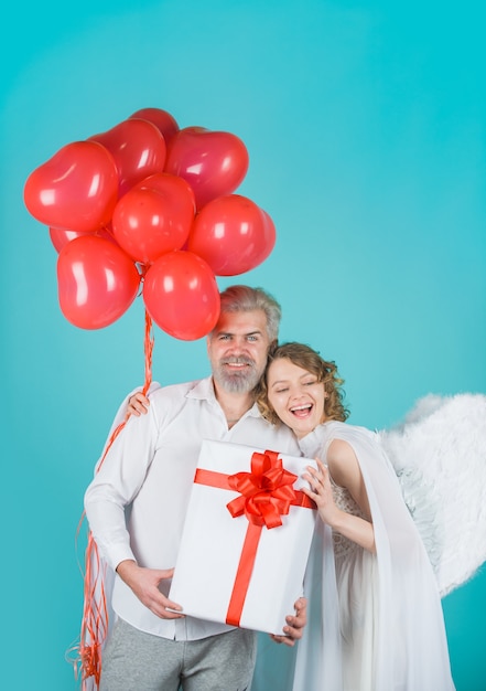 Love valentines day couple angel woman with balloons cupid in valentine day couple of cupids