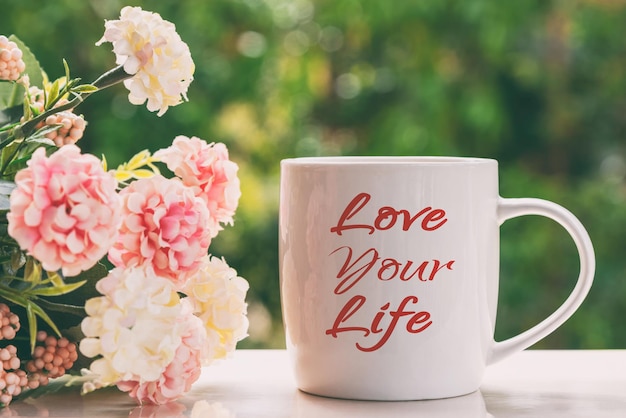 Photo love your life inspirational quotes on coffee mug