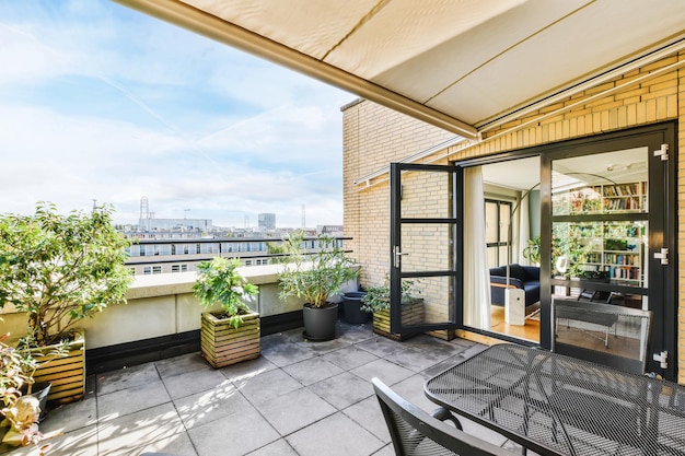 Lovely balcony with lots of potted flowers