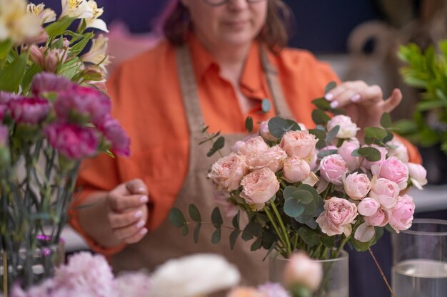 Lovely bouquet of spring flowers pink rose blooms thoughtfully designed by skilled florists as gift