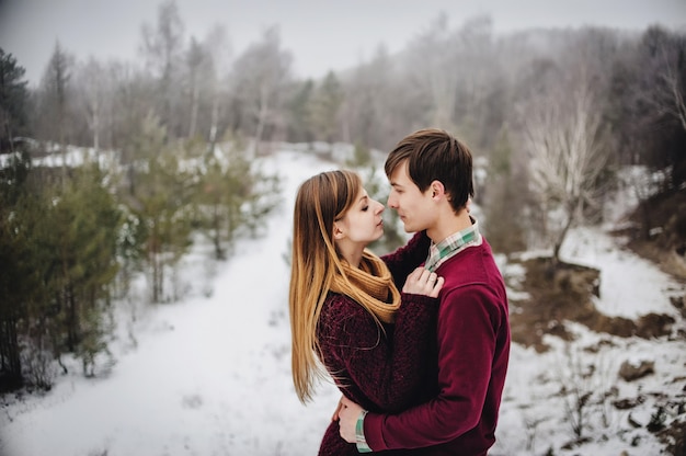 Lovely couple staying outdoors in nature