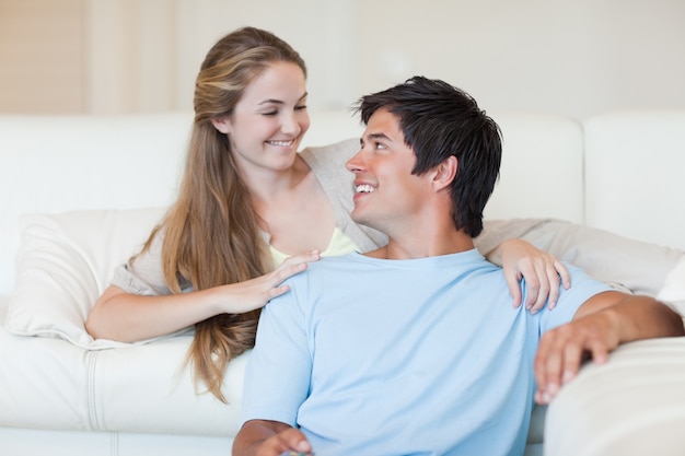 Lovely couple watching television