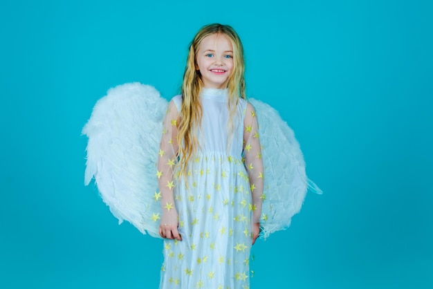 Lovely and cute little Girl angel. Little angel Girl in white dress with angel wings on isolated background.