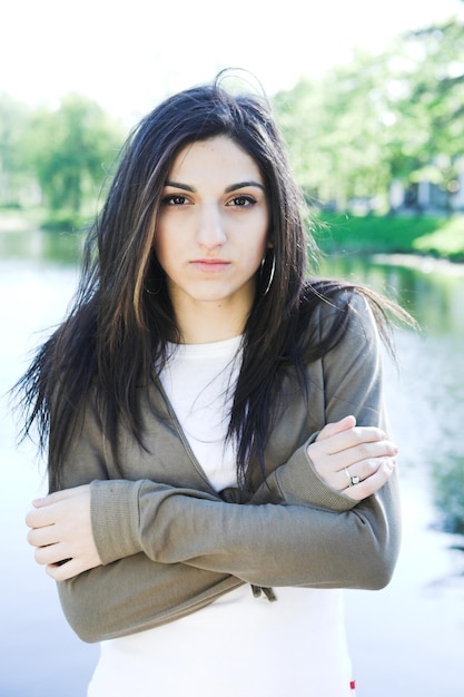 Lovely girl beside a lake