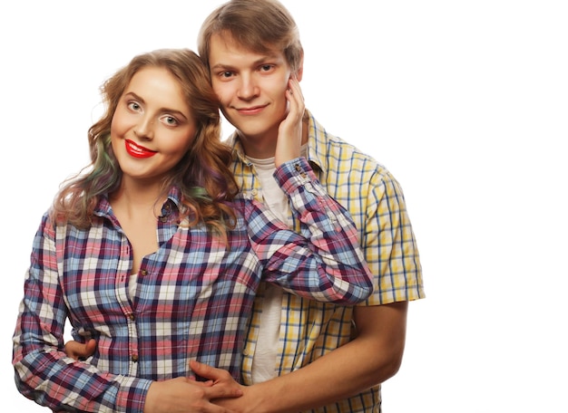 lovely happy couple hugging over white background