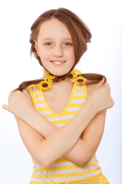 Lovely little girl holding her hair