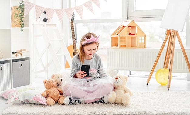 Lovely little girl with teddies