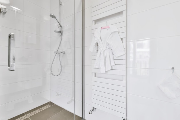 Lovely snow-white bathroom with shower