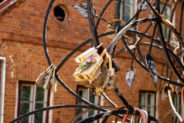 Lovers' locks hang on the bridge closeup