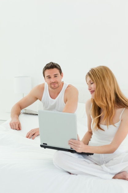 Lovers looking at the laptop 