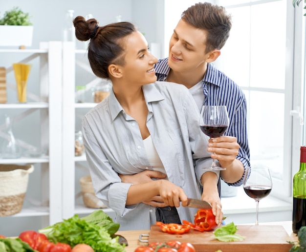 Loving couple is preparing the proper meal