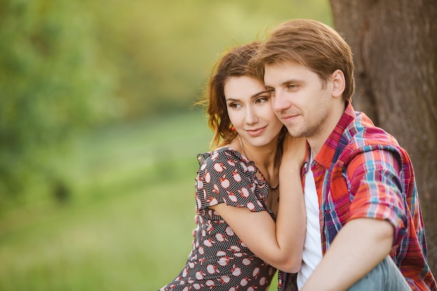 Loving couple on a meadow