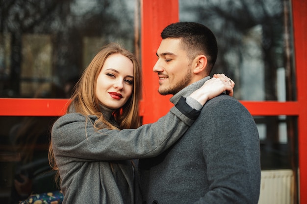 Loving couple posing outdoors