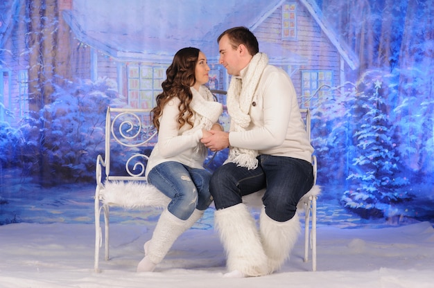 Loving man and woman celebrate christmas together