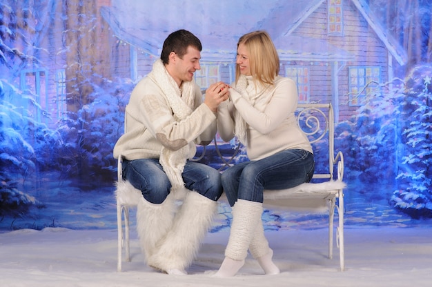 Loving man and woman celebrate christmas together