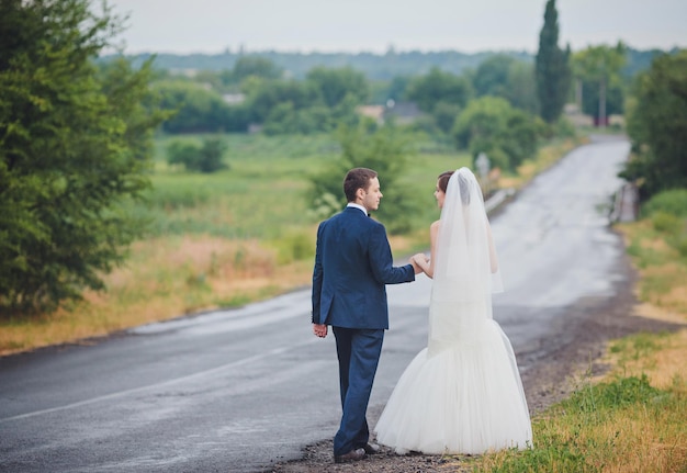 Loving wedding couple outdoor