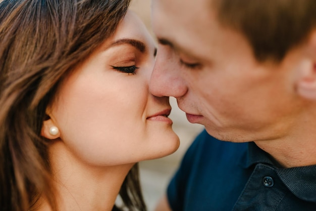 Loving young couple kissing and hugging in st valentine's day Love and tenderness dating romance family anniversary concept