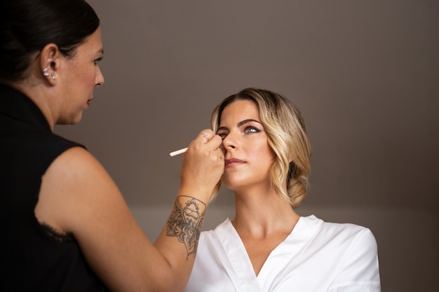 Low angle bride getting ready for event