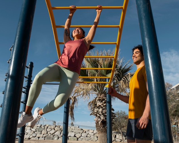 Low angle couple training outdoors