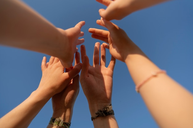 Low angle hand gestures representing friendship