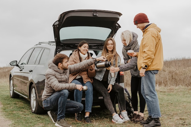 Low angle road trip with group of friends