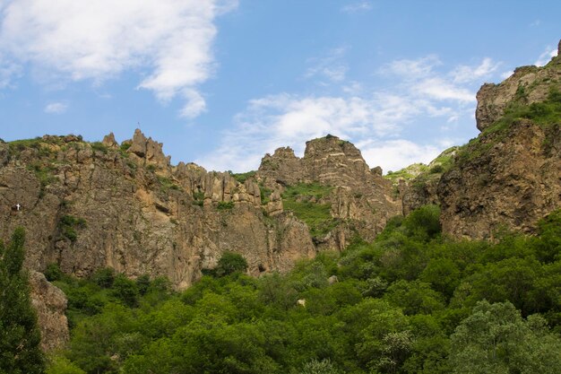 Low angle shot of beautiful rocky cliffs and mountains in the rural countryside of Armenia