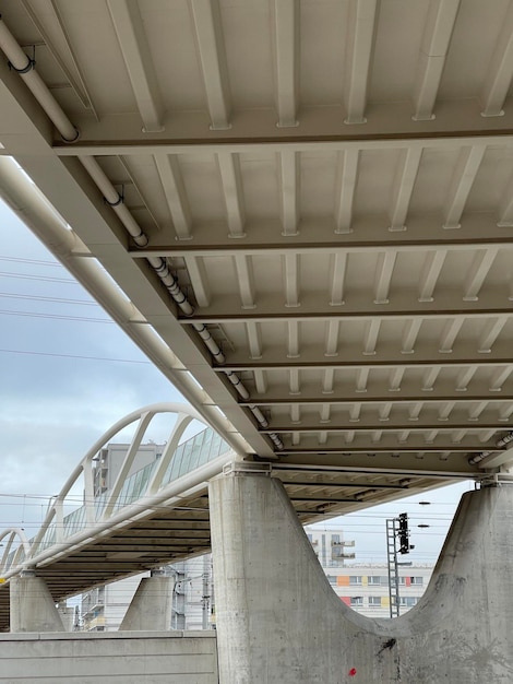 Low angle shot of a modern concrete bridge with futuristic architecture design