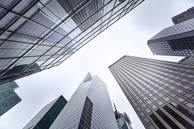 Low angle shot of the skyscrapers against the blue sky in Manhattan, New York City