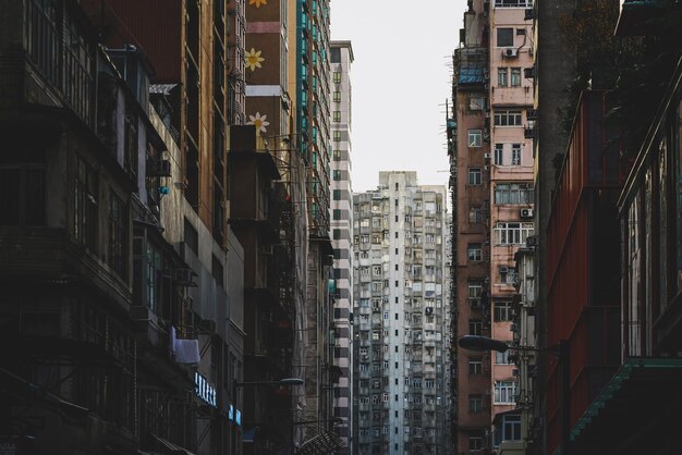 Low angle view of buildings in city against sky